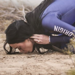 Katy Perry kisses the earth